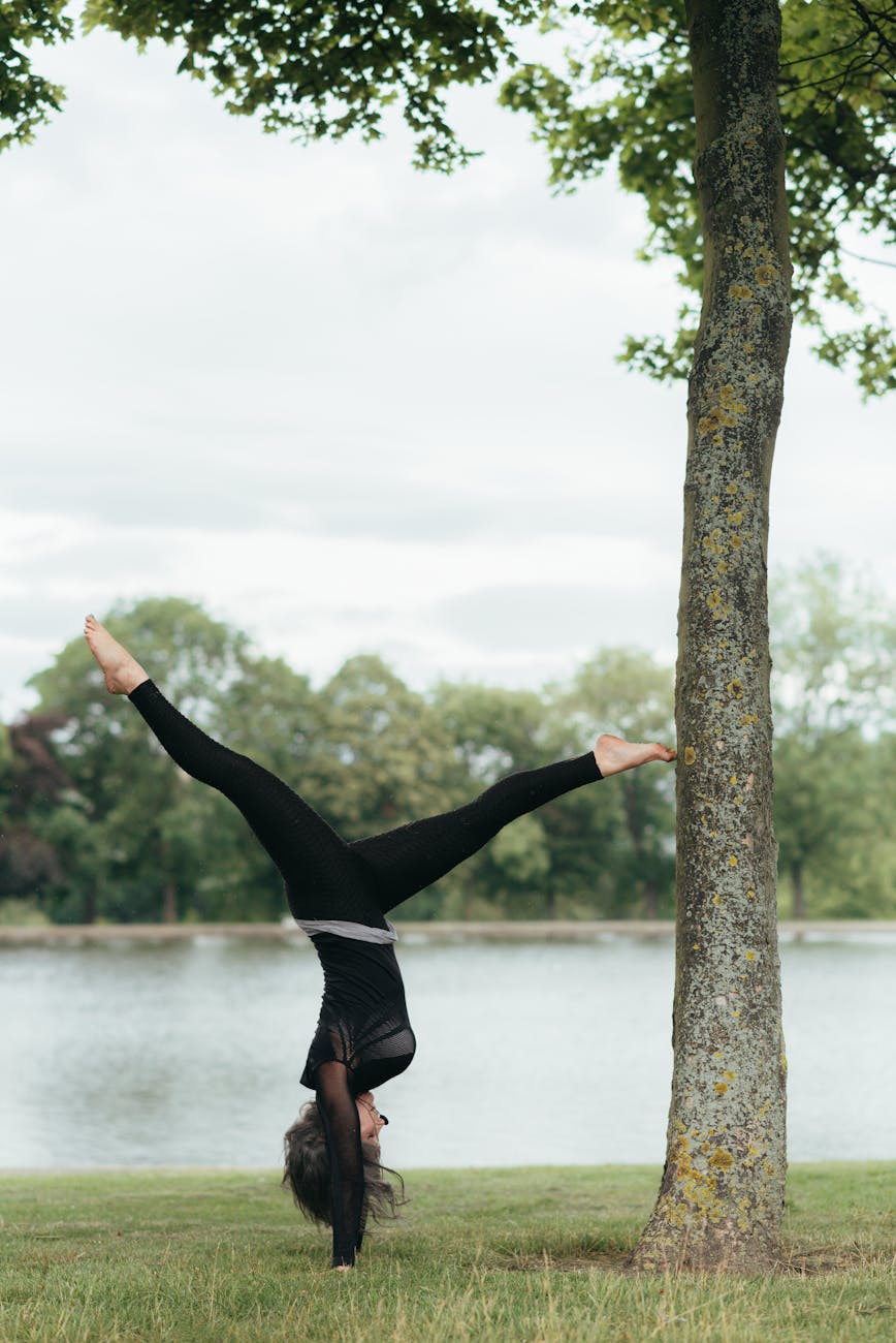 Woman performing a gentle yoga stretch to improve flexibility.
